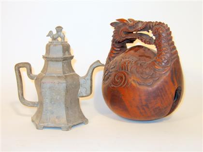 Appraisal: Chinese pewter teapot and wood slit drum th century and