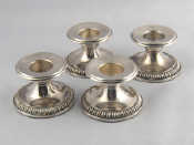 Appraisal: A set of four German sterling silver dwarf candlesticks