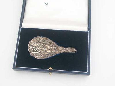 Appraisal: A George III stamped 'eagles wing' caddy spoon by Joseph