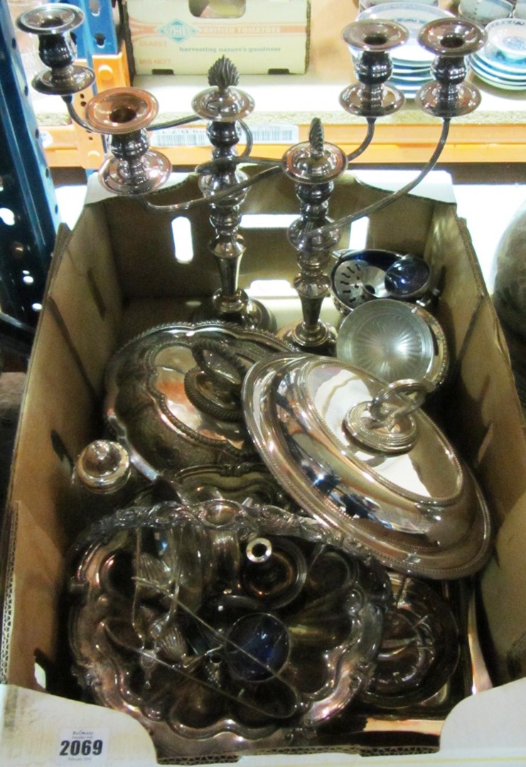 Appraisal: A quantity of silver plate including candlesticks tureens dishes and