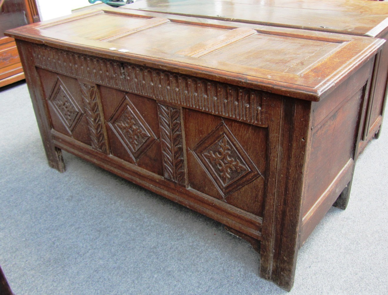 Appraisal: A th century oak coffer with triple panel top and