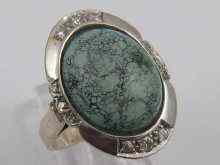 Appraisal: A ct white gold lady's dress ring set with turquoise