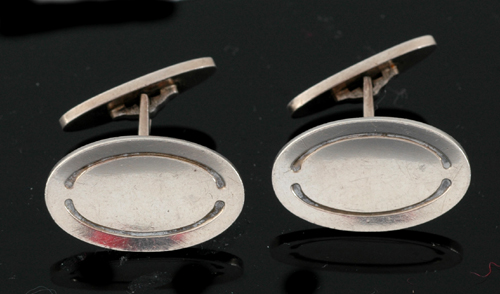 Appraisal: A pair of silver cufflinks by Georg Jensen The sterling