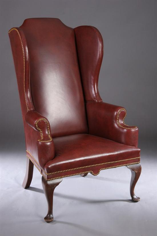 Appraisal: GEORGE III-STYLE NAILED LEATHER EASY CHAIR th century Raised on