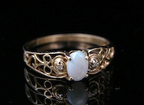 Appraisal: A Delicate Ladies' Ring with an Opal A k yellow