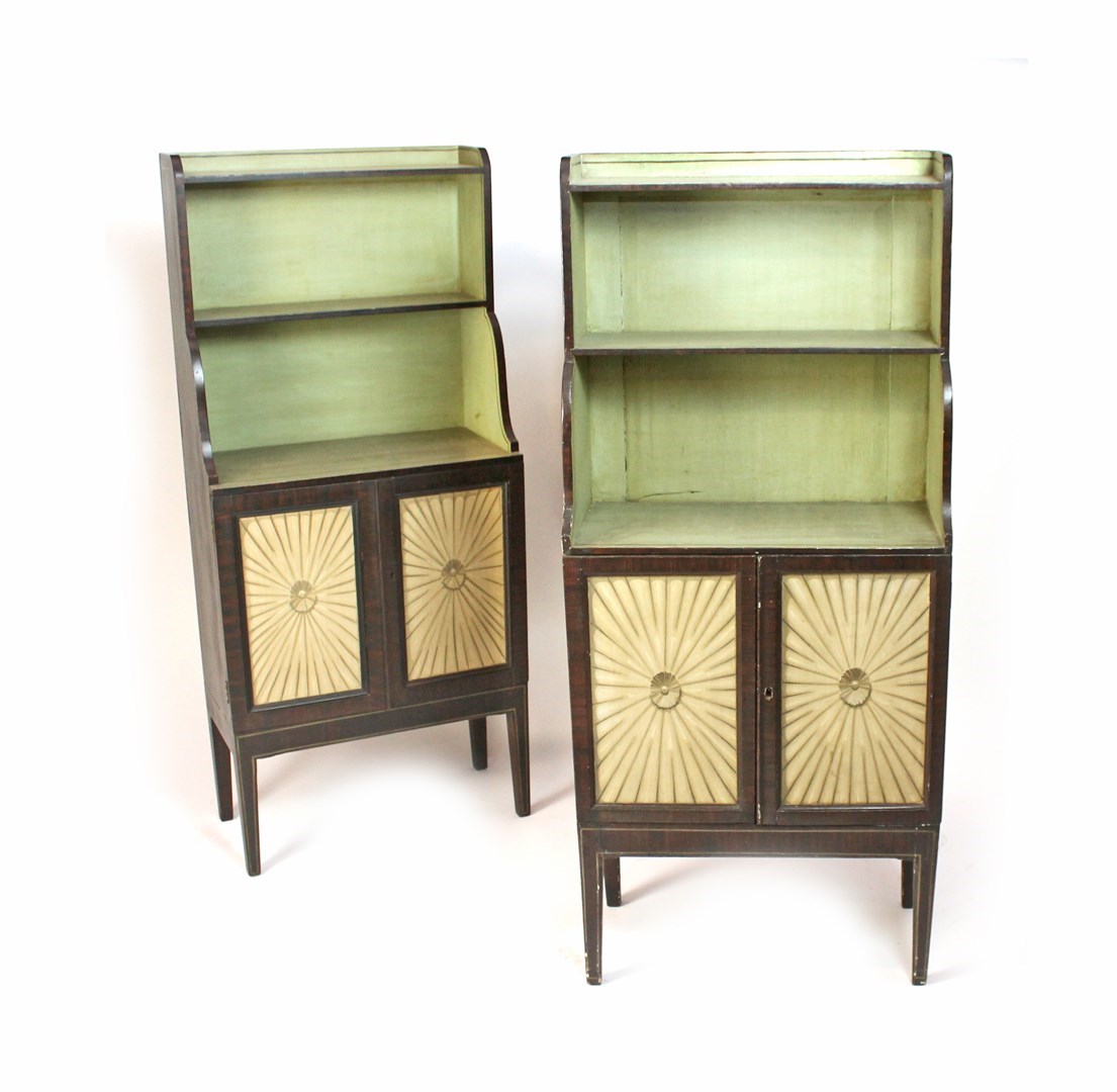 Appraisal: A near pair of faux rosewood painted waterfall bookcase cabinets