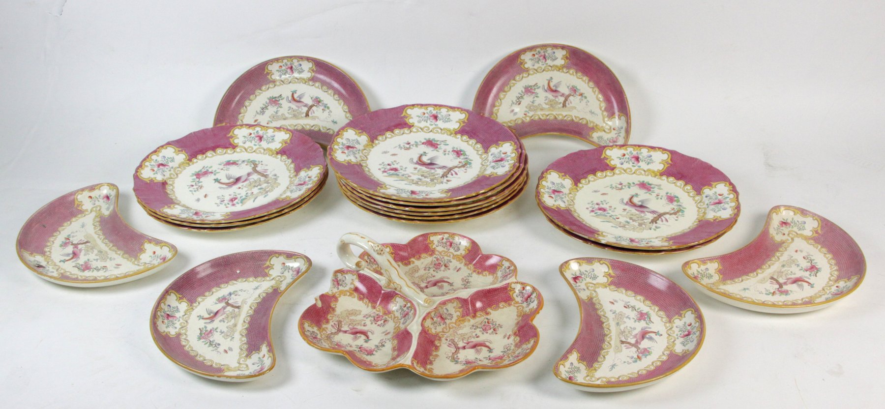 Appraisal: A quantity of Mintons 'Pink Cockatrice' pattern dinner wares comprising