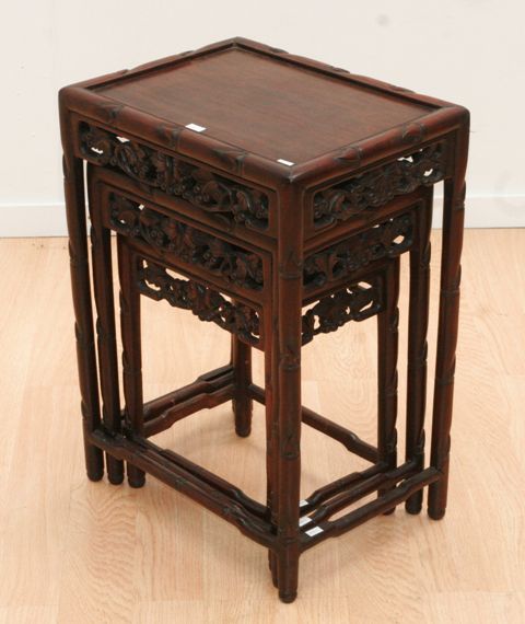 Appraisal: A nest of three Chinese carved rosewood occasional tables cms