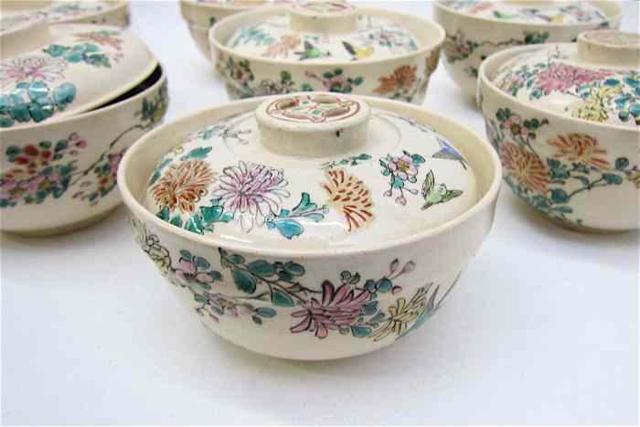 Appraisal: EIGHT CHINESE PORCELAIN COVERED SOUP BOWLS hand enameled in floral