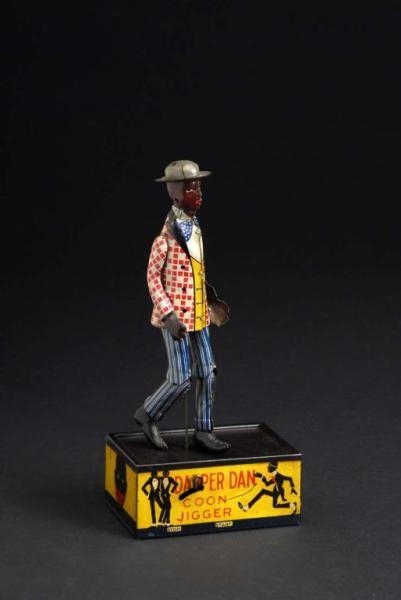 Appraisal: Tin Marx Dapper Dan Roof Dancing Toy Description American Working