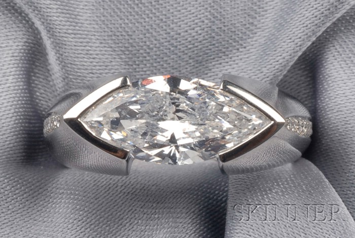 Appraisal: Platinum and Diamond Ring Neiman Marcus set with a marquise-cut