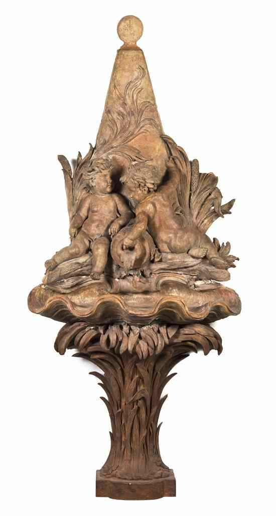 Appraisal: A Continental Terracotta and Carved Wood Fountain in five parts