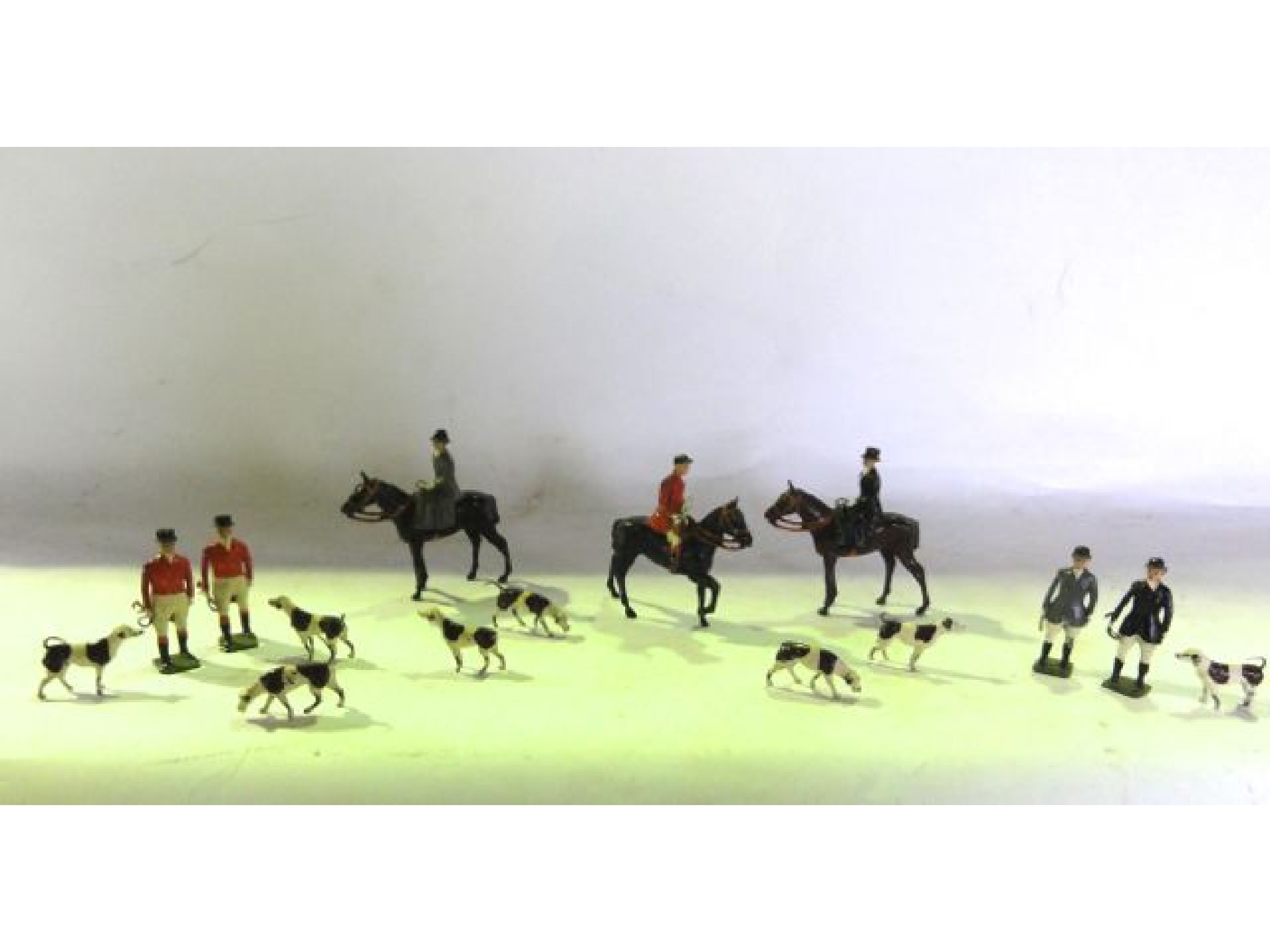 Appraisal: A vintage painted lead assembly of a hunting group comprising