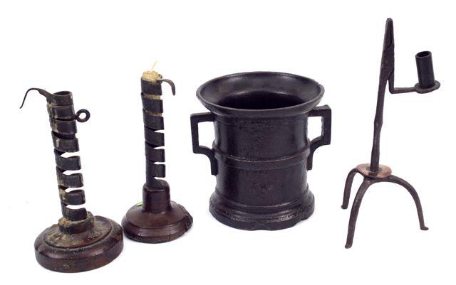 Appraisal: th th CENTURY WROUGHT-IRON RUSHNIP CANDLEHOLDER the stem fitted with