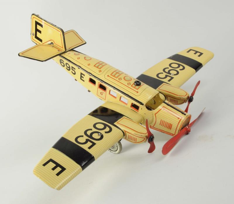 Appraisal: German Tin Litho Gunthermann Airplane Toy Nice bright colors Tri-motor