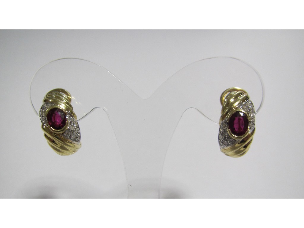 Appraisal: An eighteen carat gold ruby and diamond set earrings of