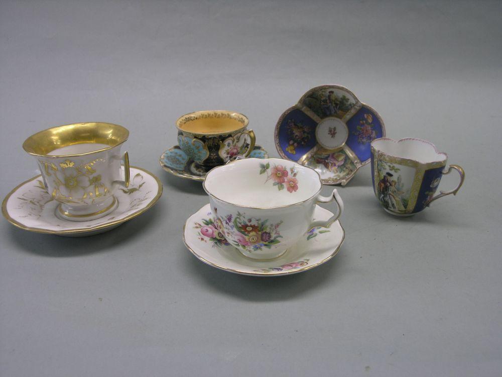 Appraisal: A Chamberlains Worcester cup and saucer a Helena Wolfsohn cabinet