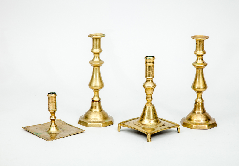 Appraisal: TWO CONTINENTAL BAROQUE BRASS CANDLESTICKS AND A PAIR OF VICTORIAN