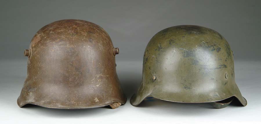 Appraisal: LOT OF FOUR GERMAN HELMETS One helmet has the German