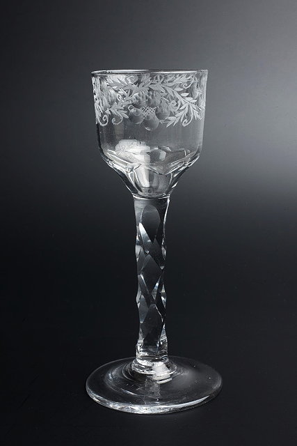 Appraisal: AN TH CENTURY WINE GLASS the bowl engraved with flowering