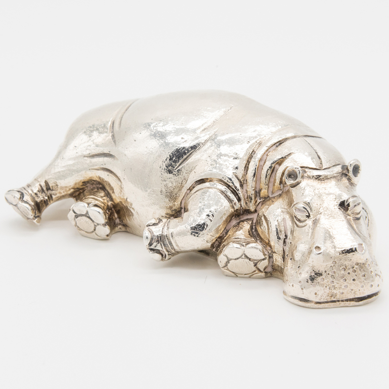 Appraisal: ASPREY SILVER FIGURE OF A RECLINING HIPPO Marked London in