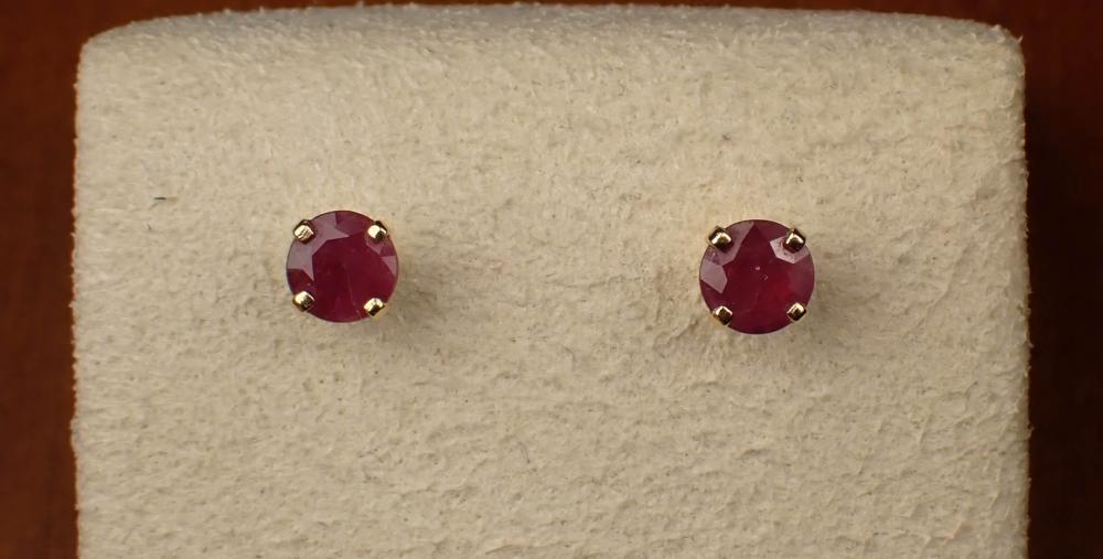 Appraisal: PAIR OF RUBY AND FOURTEEN KARAT GOLD EAR STUDS each