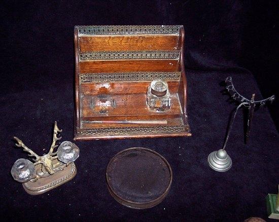 Appraisal: An Edwardian oak and gilt metal mounted inkstand and stationery