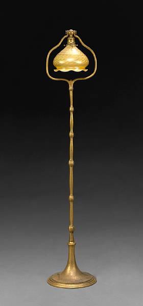 Appraisal: A Tiffany Studios gilt bronze harp floor lamp with an