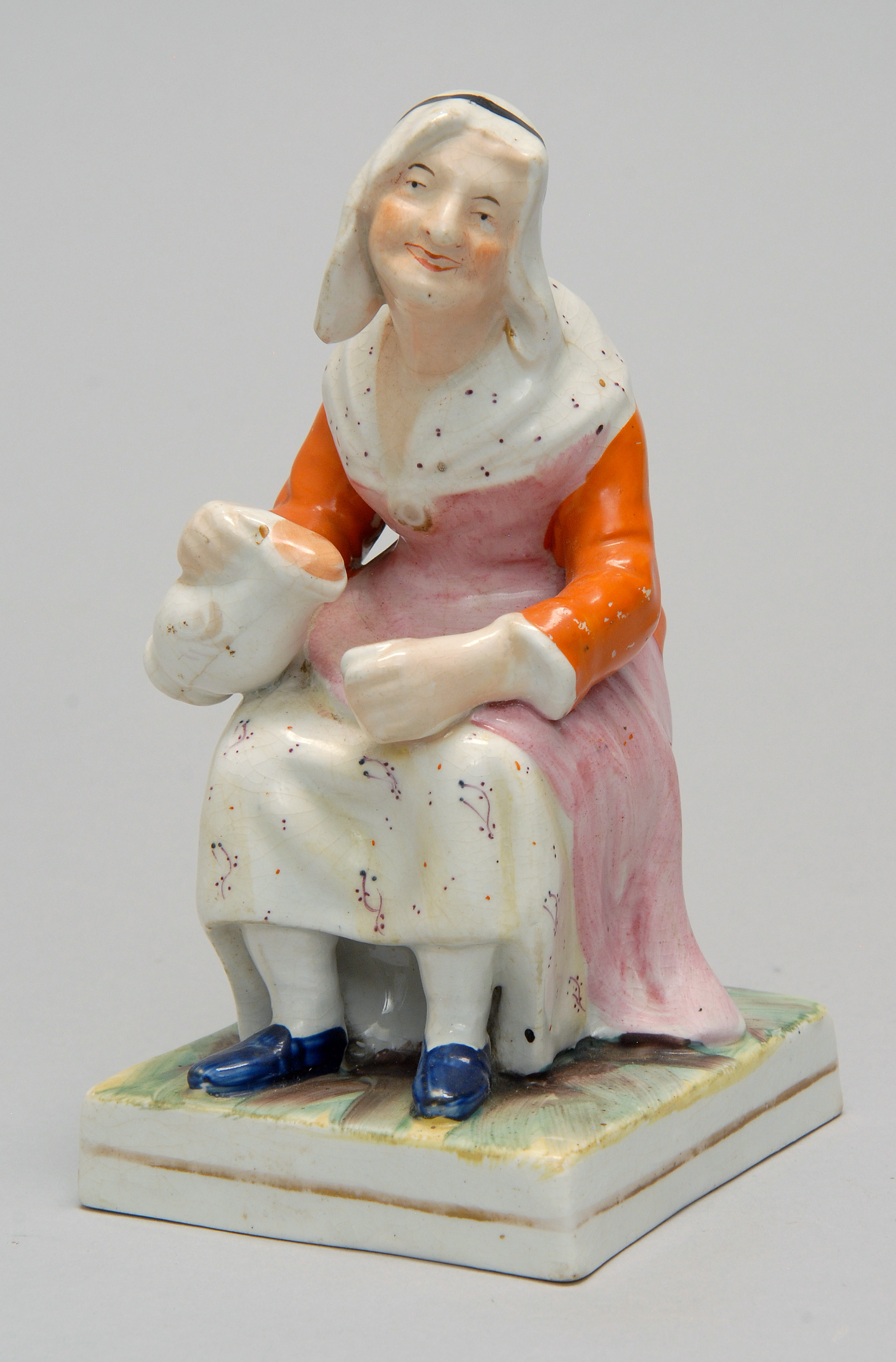 Appraisal: TH CENTURY STAFFORDSHIRE FIGURE of Wife Nell Modeled as a