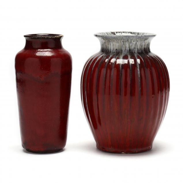 Appraisal: TWO ASIAN FLAMBE VASES th century includes a dark red