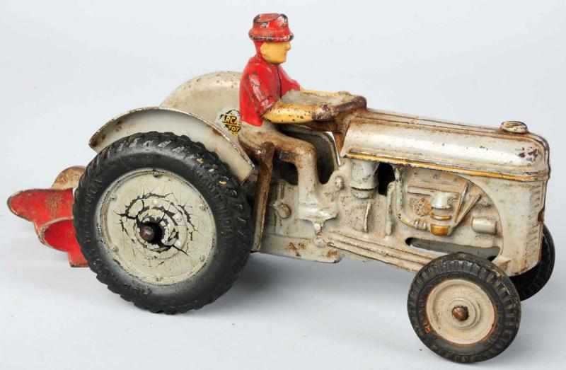 Appraisal: Scarce Cast Iron Arcade Tractor Toy American Possibly a salesman