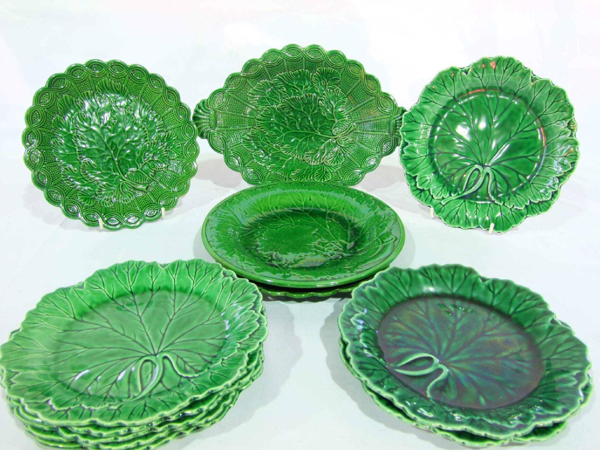 Appraisal: A collection of th century green glazed majolica leaf moulded