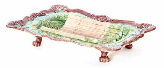 Appraisal: Majolica asparagus footed serving dish late th century scroll-bound rectangular