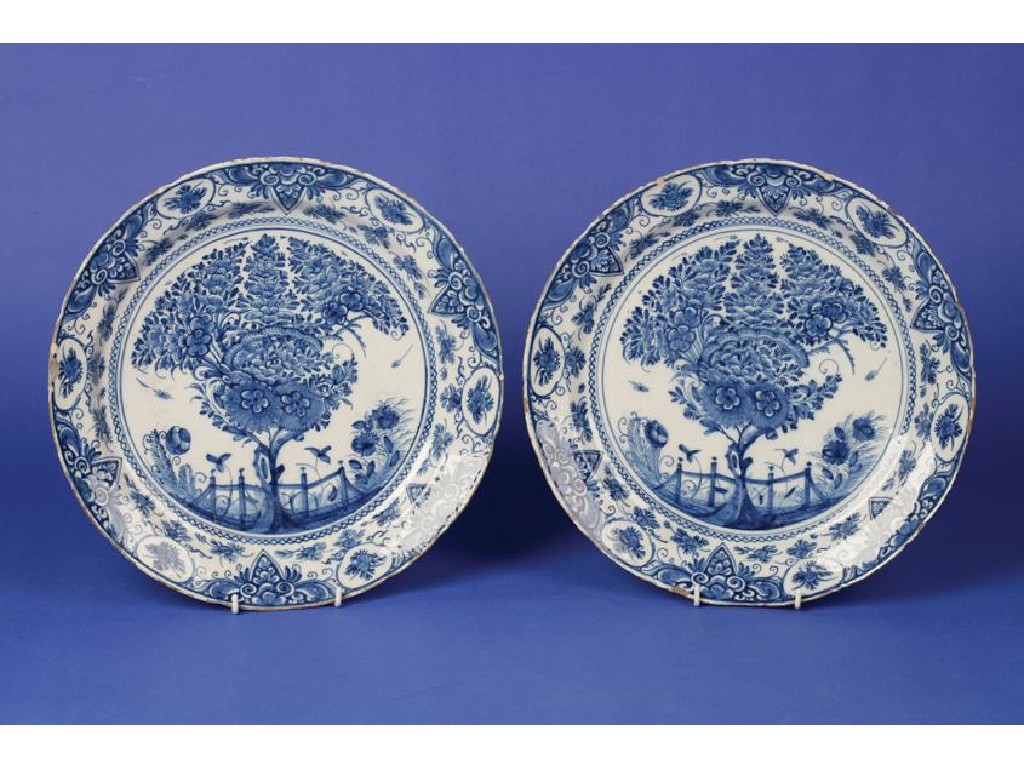 Appraisal: A PAIR OF DELFTWARE BLUE AND WHITE CHARGES ensuite with