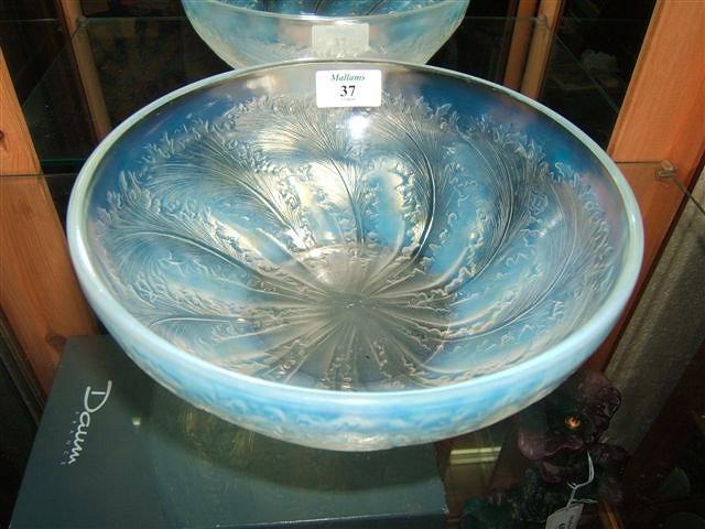 Appraisal: A Lalique leaf moulded bowl with moulded mark 'R Lalique'