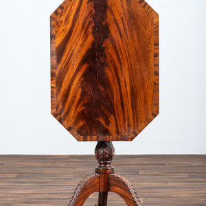 Appraisal: A Late Federal Carved and Figured Mahogany Octagonal Tilt-Top Candlestand