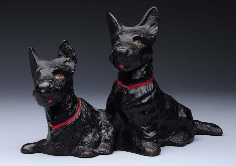 Appraisal: Cast Iron Double Scotties Dog Doorstop Made by Hubley cat