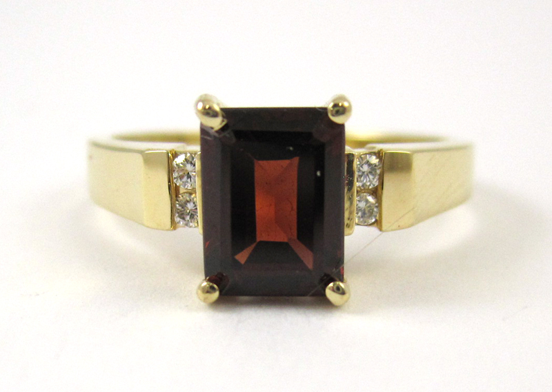 Appraisal: GARNET DIAMOND AND FOURTEEN KARAT GOLD RING set with four