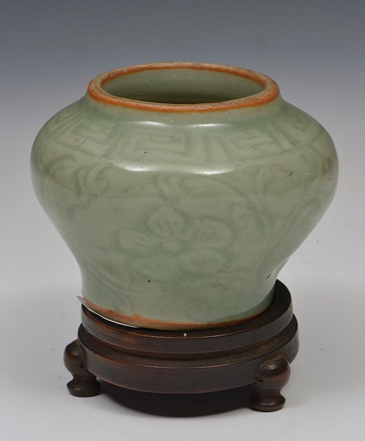 Appraisal: A CHINESE MING PERIOD CELADON SMALL WATER POT with Greek