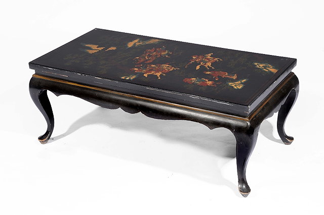 Appraisal: A Chinese black lacquer low table th Centurycover decorated with