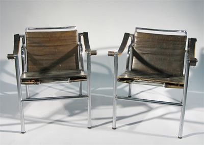 Appraisal: A pair of chromed steel B armchairs designed by Le