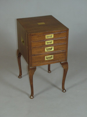 Appraisal: A mahogany and brass inlaid cutlery chest of four long