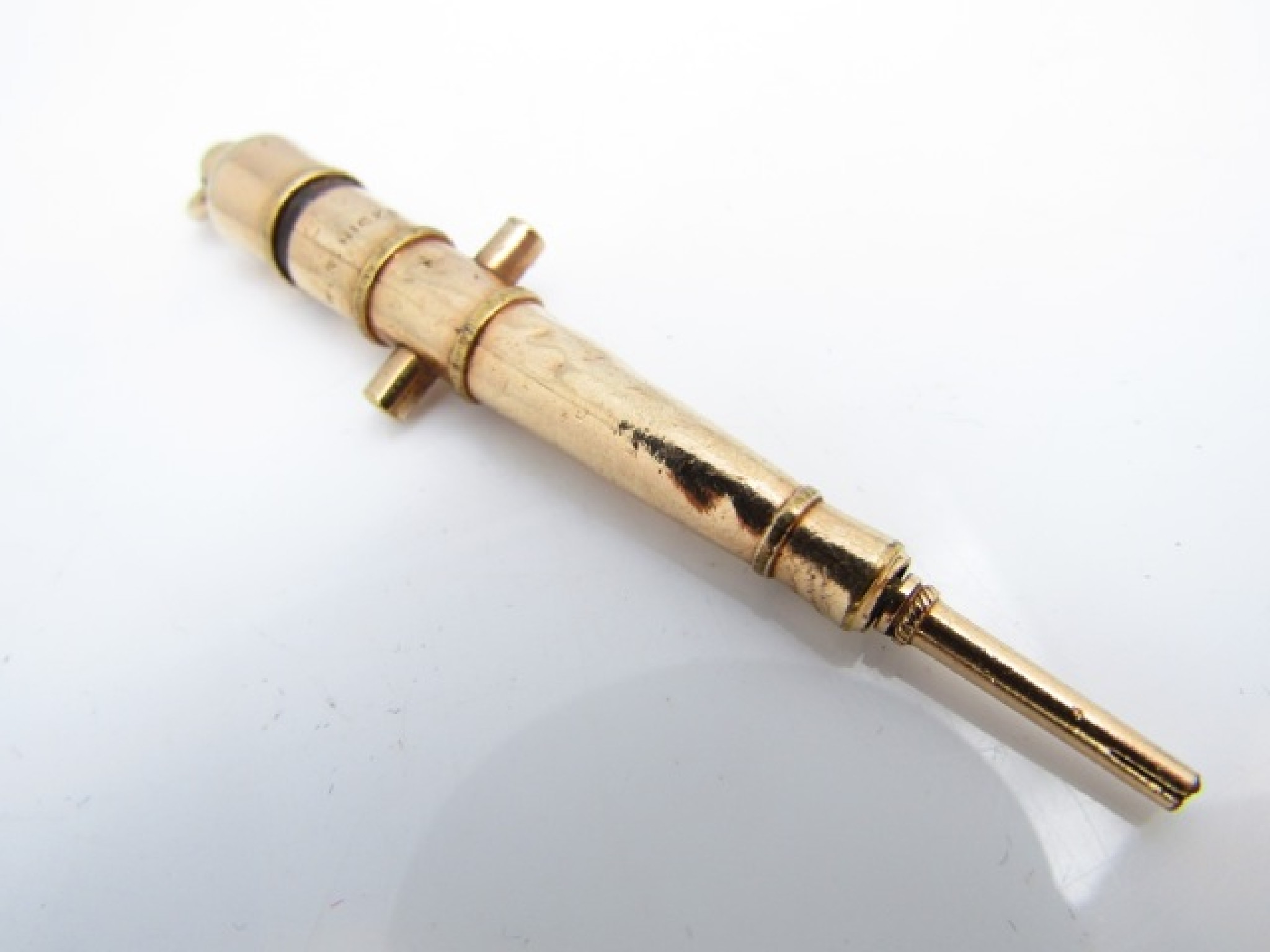 Appraisal: A gilt metal pencil W S Hicks in the form