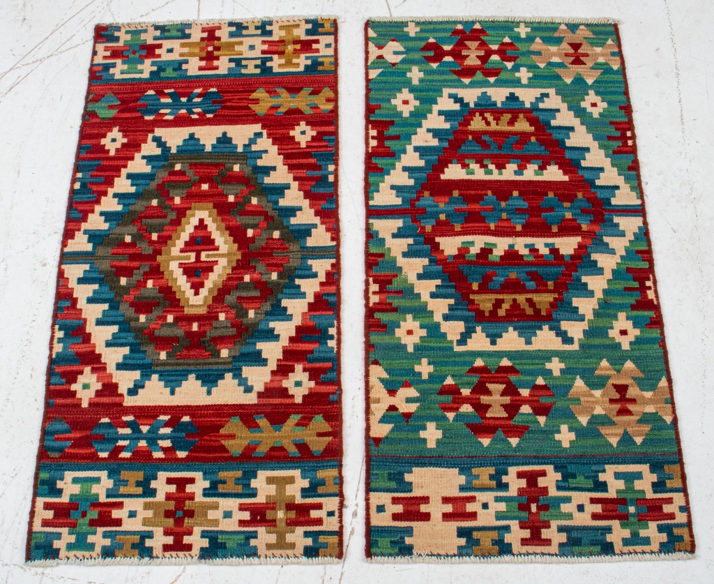 Appraisal: NAVAJO WOOL RUG PAIR Pair of Navajo small wool rug