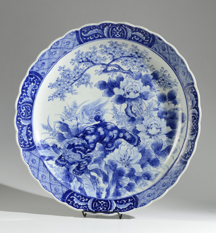 Appraisal: CHINESE CERAMIC BLUE AND WHITE CHARGER featuring peonies surrounding a