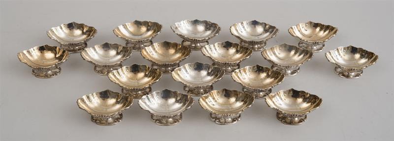 Appraisal: SET OF EIGHTEEN AMERICAN SILVER FOOTED INDIVIDUAL SALTS With lion-headed