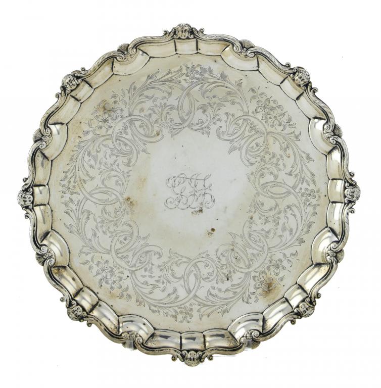 Appraisal: A GEORGE II SALVER with moulded border and scrolling rim