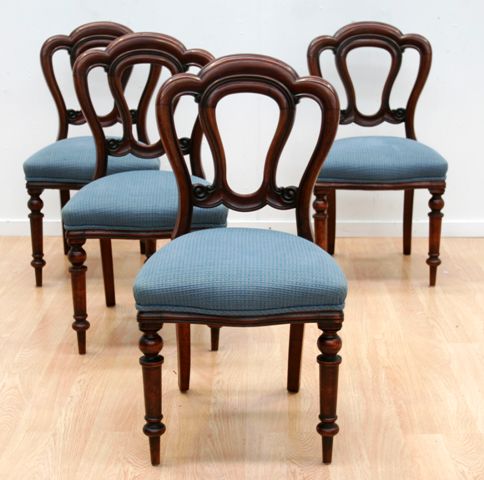 Appraisal: A set of four Victorian walnut dining chairs