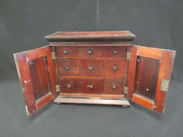 Appraisal: th Century Spice Cabinet drawers behind double doors bun feet