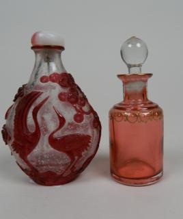 Appraisal: Peking glass snuff bottle Peking glass snuff bottle together with